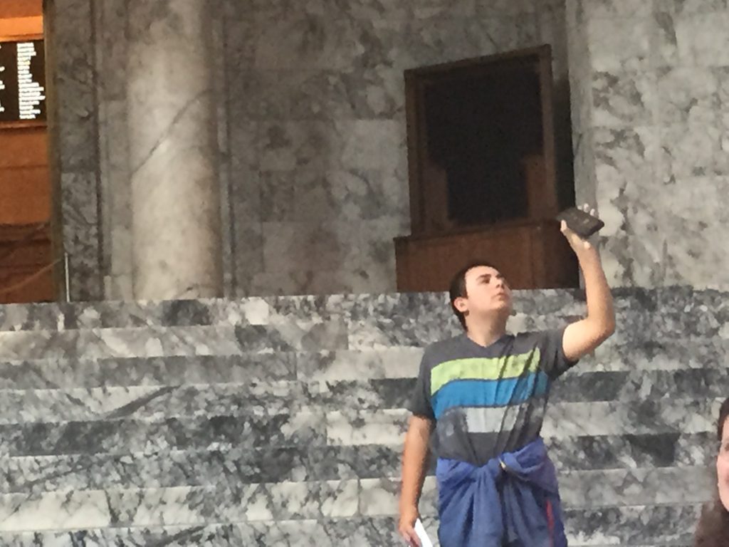 Aiden taking photos of the amazing interior of the Washington State Capitol in Olympia